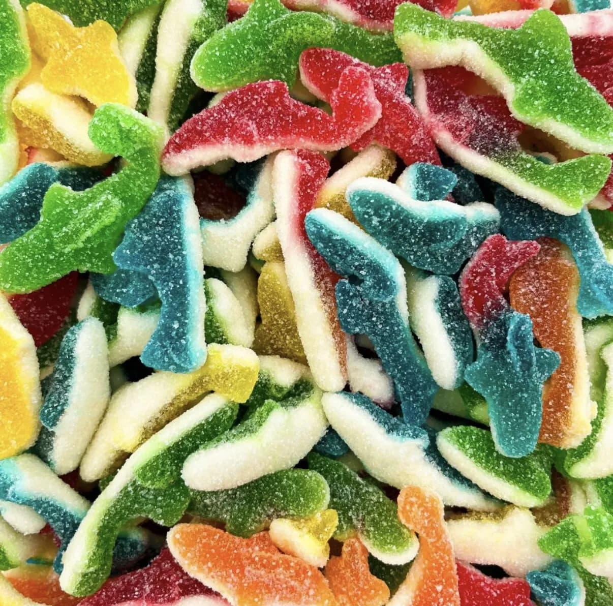 Requins colorés sucrés - 100 gr